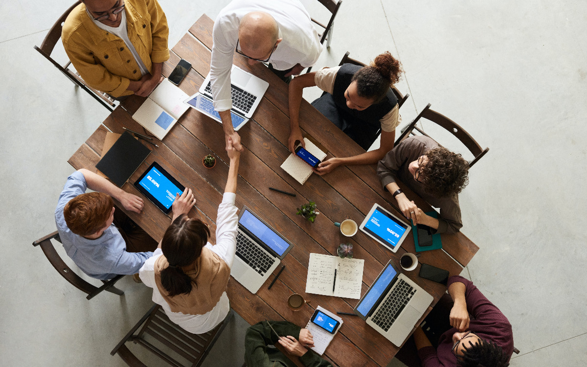 Group meeting around a table for a business meeting