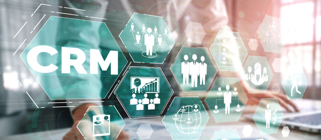 The letters CRM and a variety of sales themed icons to represent a sales tech stack.