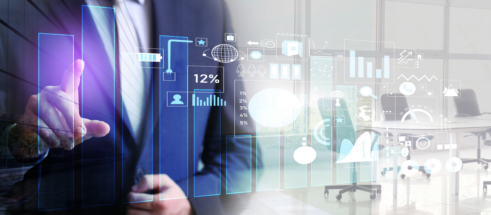 A man interacting with digital graphs in an office as part of tech consulting.