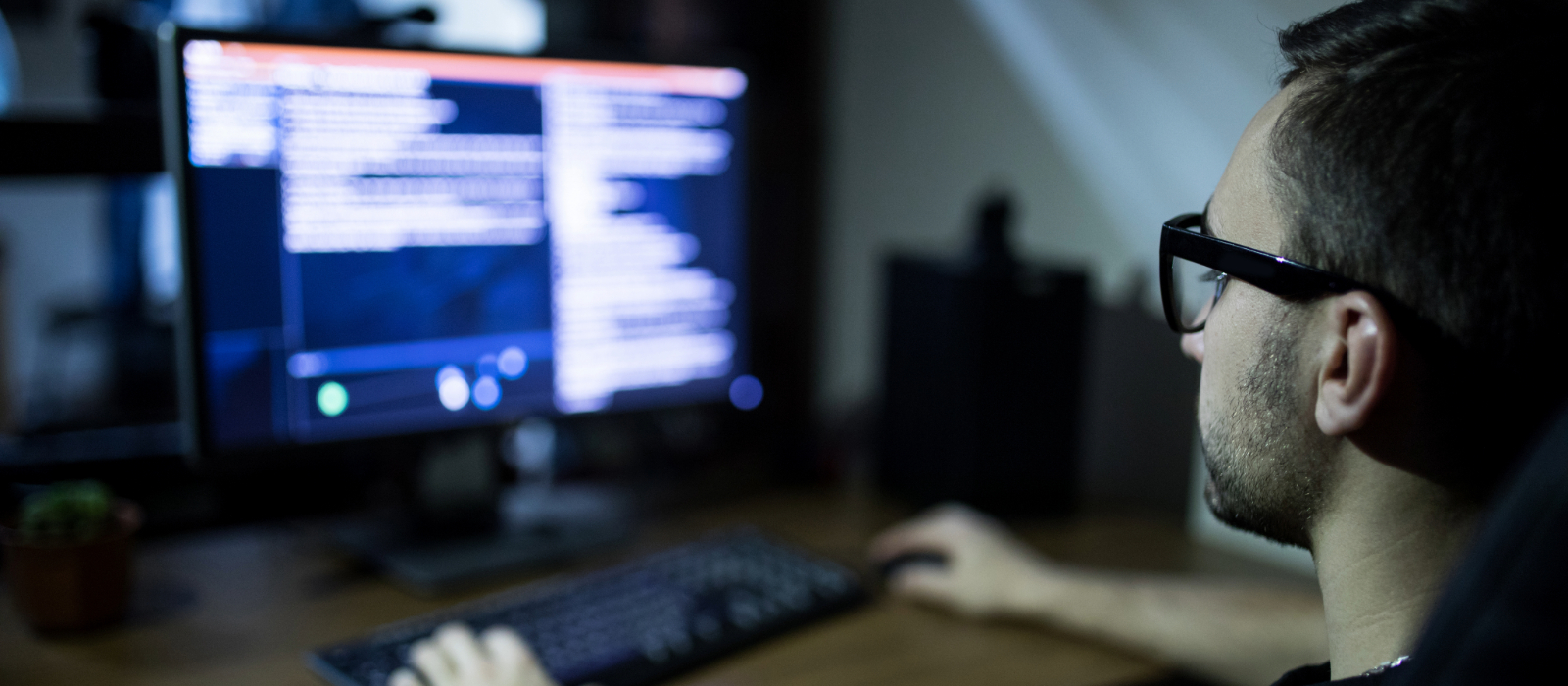 Computer user dealing with a cyberattack.