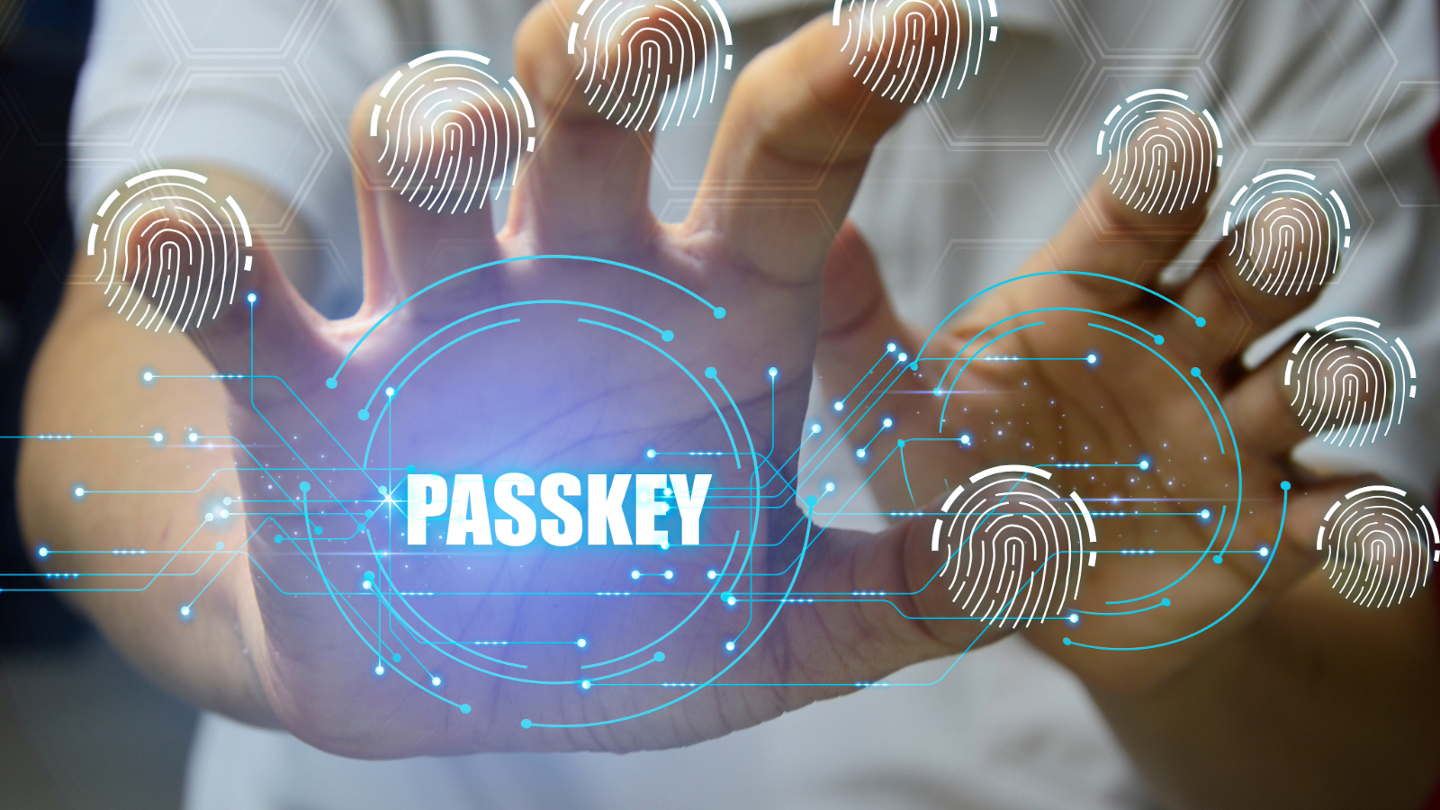 A person reaching toward the camera with digital fingerprint icons overlaid on their hands, centered around the word 