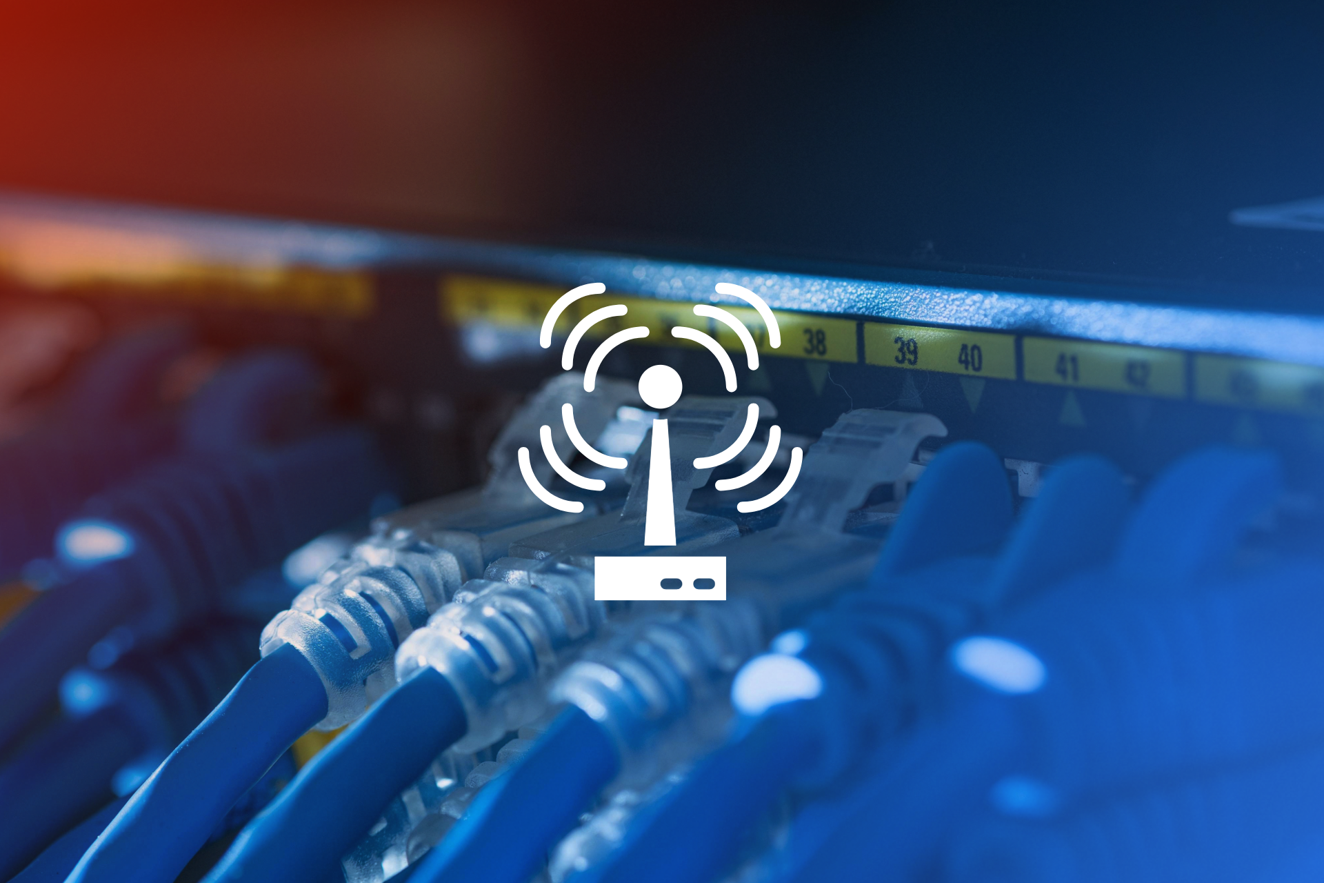 Close-up of network cables connected to a switch with a wireless signal icon overlay.